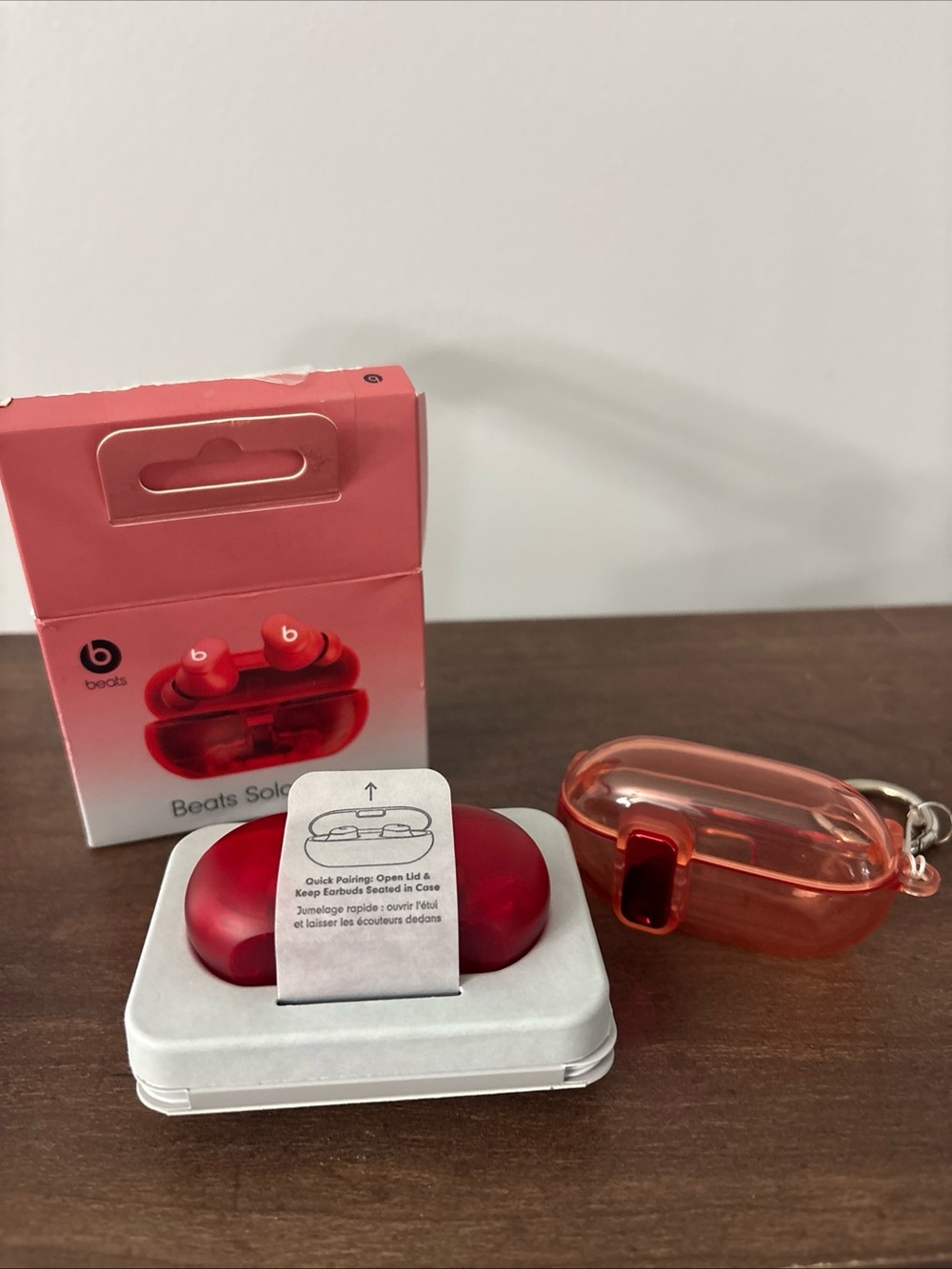 Beats by Dre Solo3 Wireless Earbuds in Red with Translucent Red Case